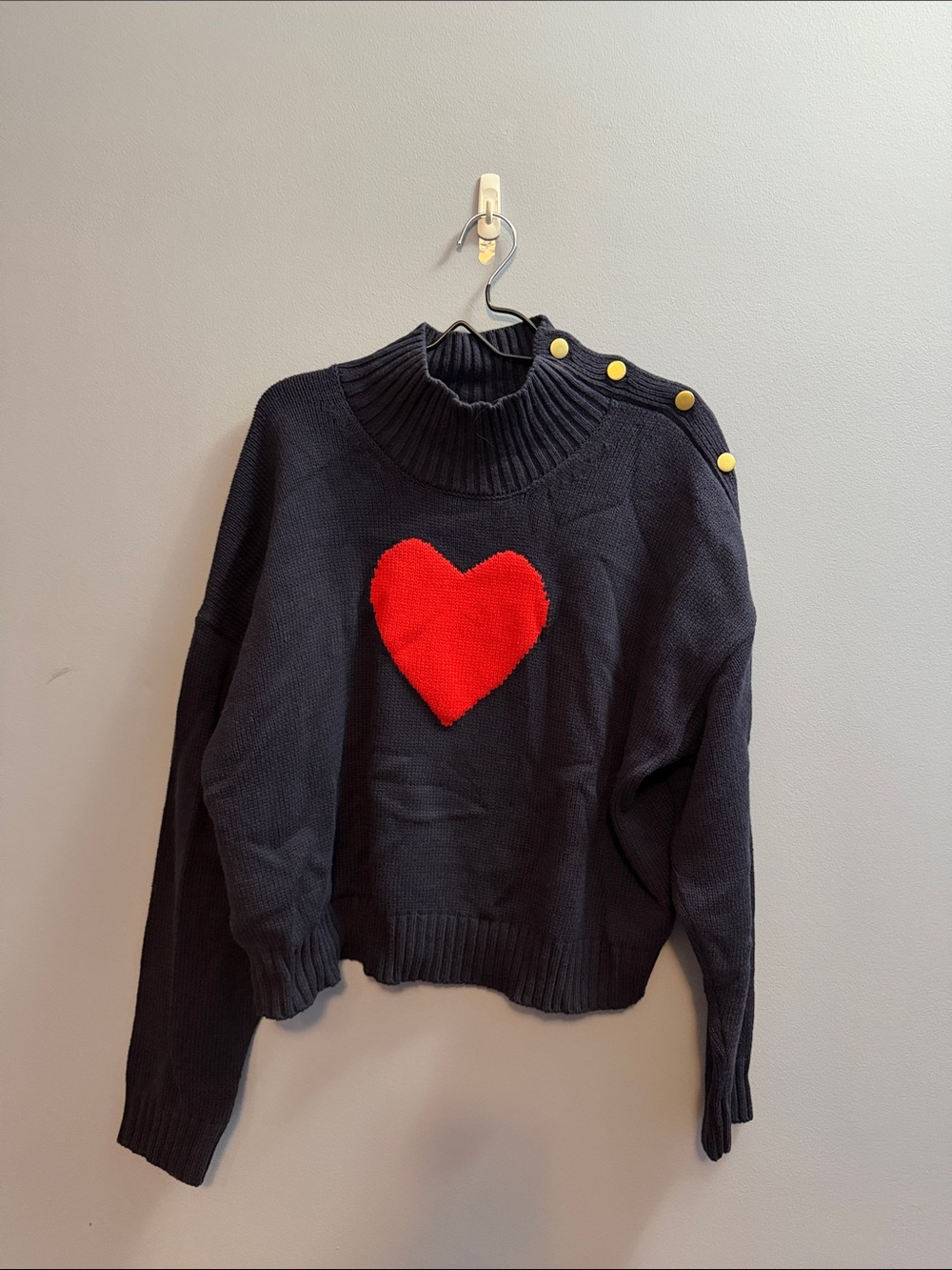 Black Cowl Sweater with Red Heart Accent and Gold Shoulder Buttons